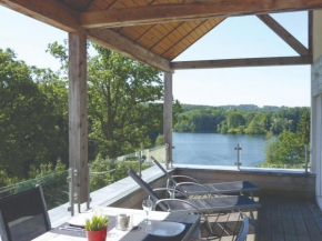 Luxury holiday apartment with a sauna fireplace and views over a lake